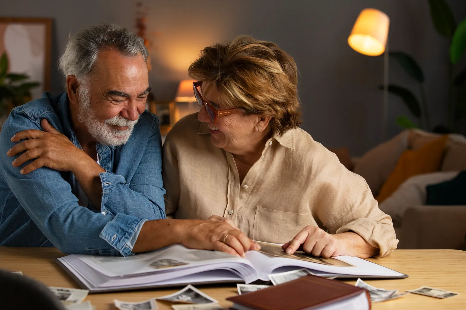 An older couple talking closely at home